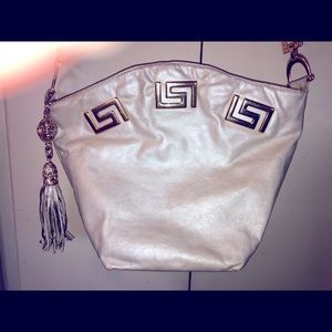 Versace-esque silver purse.